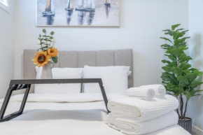 Stylish Getaway 2BD Basement by YMCA and South Health Campus Hospital